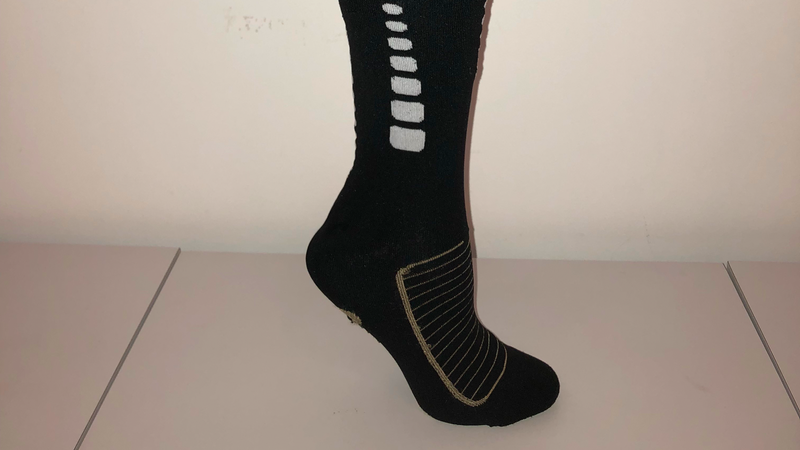 A Myant sock with knit heated zones, pressure sensors and stretch sensors. (Battery not pictured.)